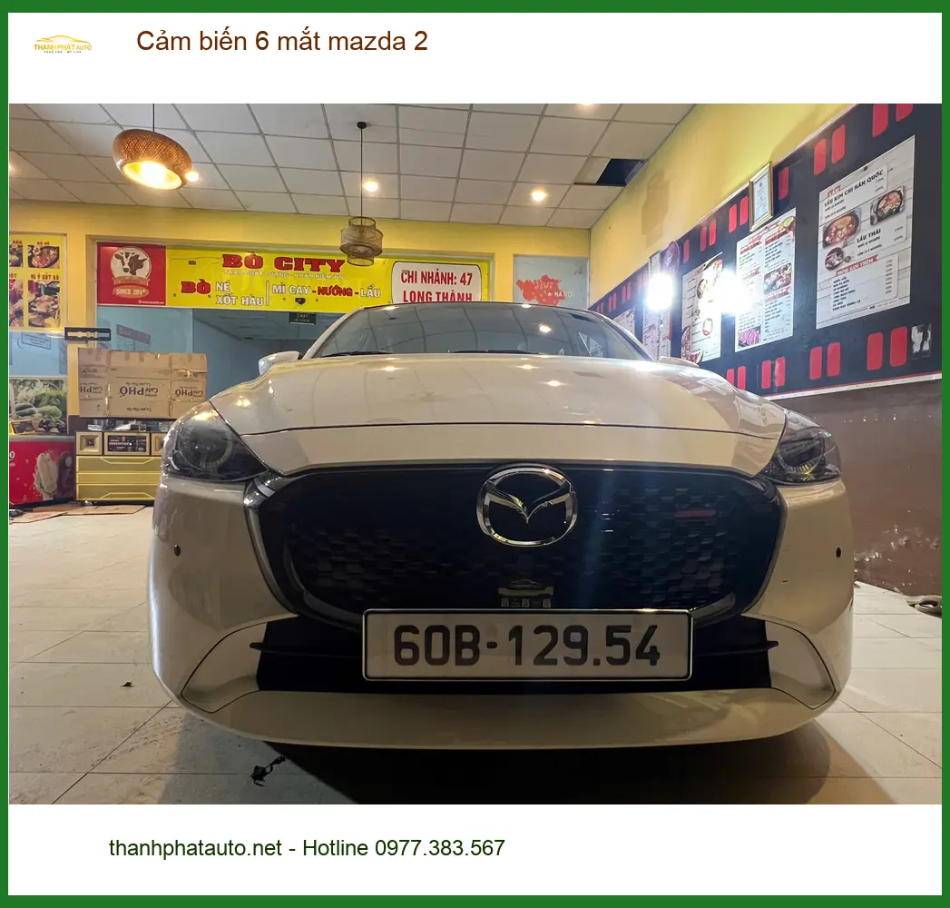 Anh Bảo lắp cảm biến 6 mắt Mazda 2 tại Quận Thủ Đức để lái xe an toàn hơn