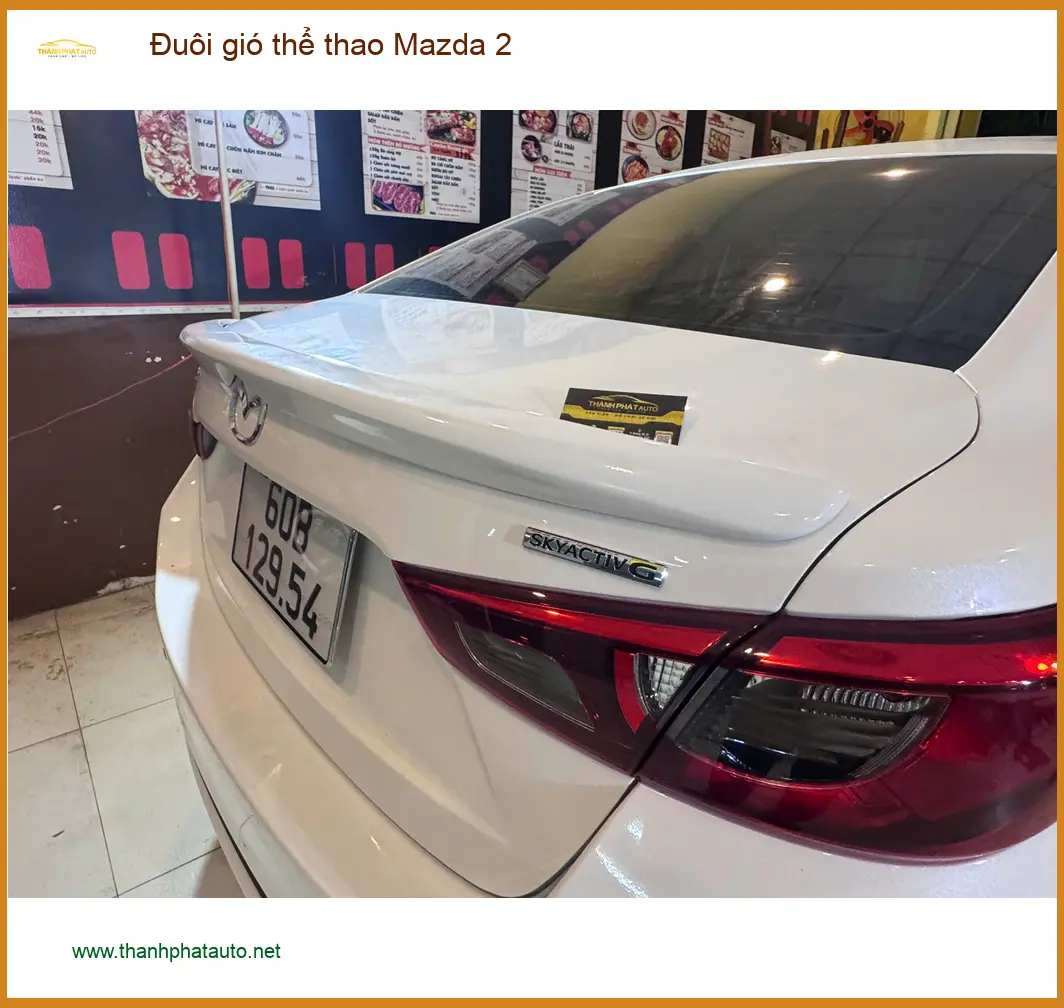 Anh Minh lắp đuôi gió thể thao Mazda 2 tại Quận 12 giúp xe thêm cá tính ảnh thực tế 2