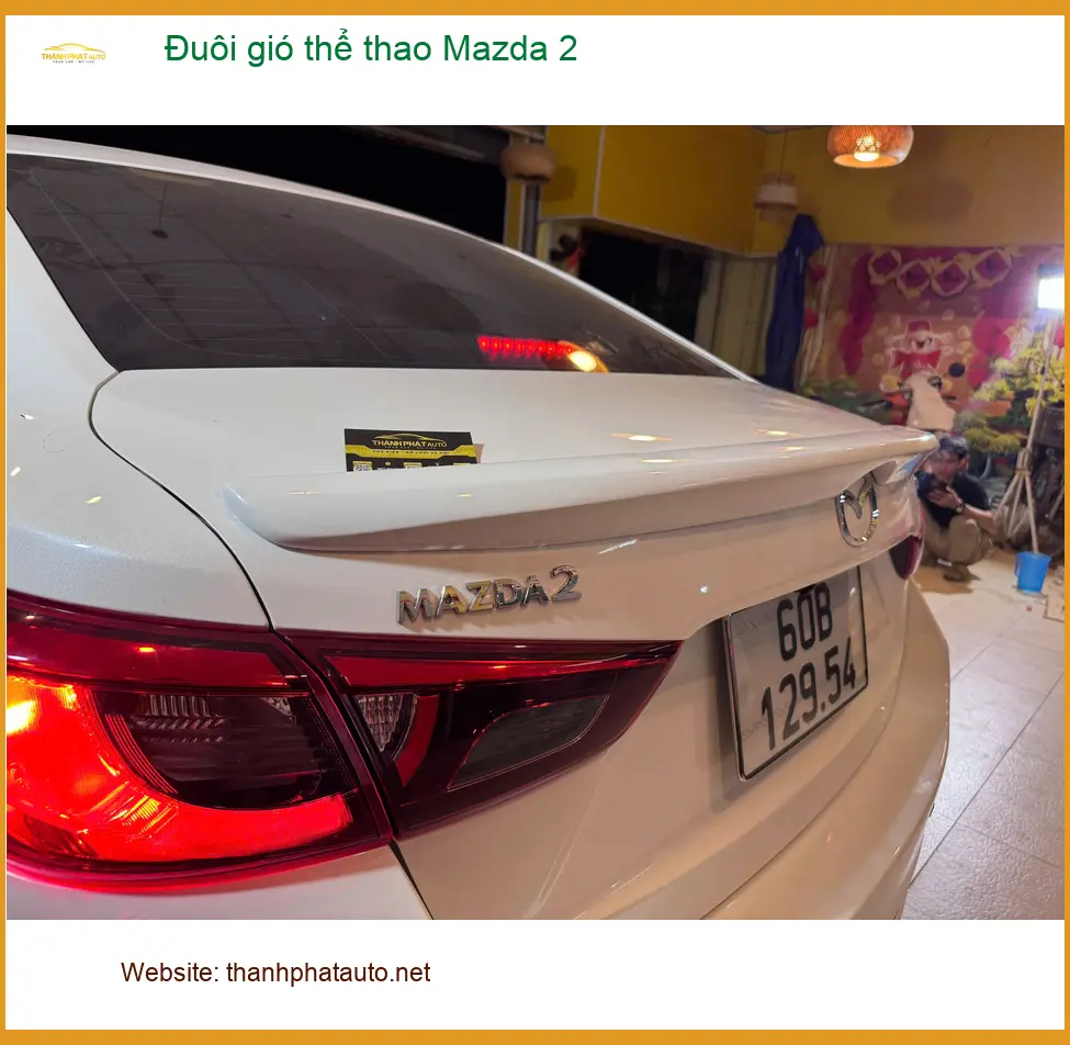 Anh Minh lắp đuôi gió thể thao Mazda 2 tại Quận 12 giúp xe thêm cá tính ảnh thực tế 3