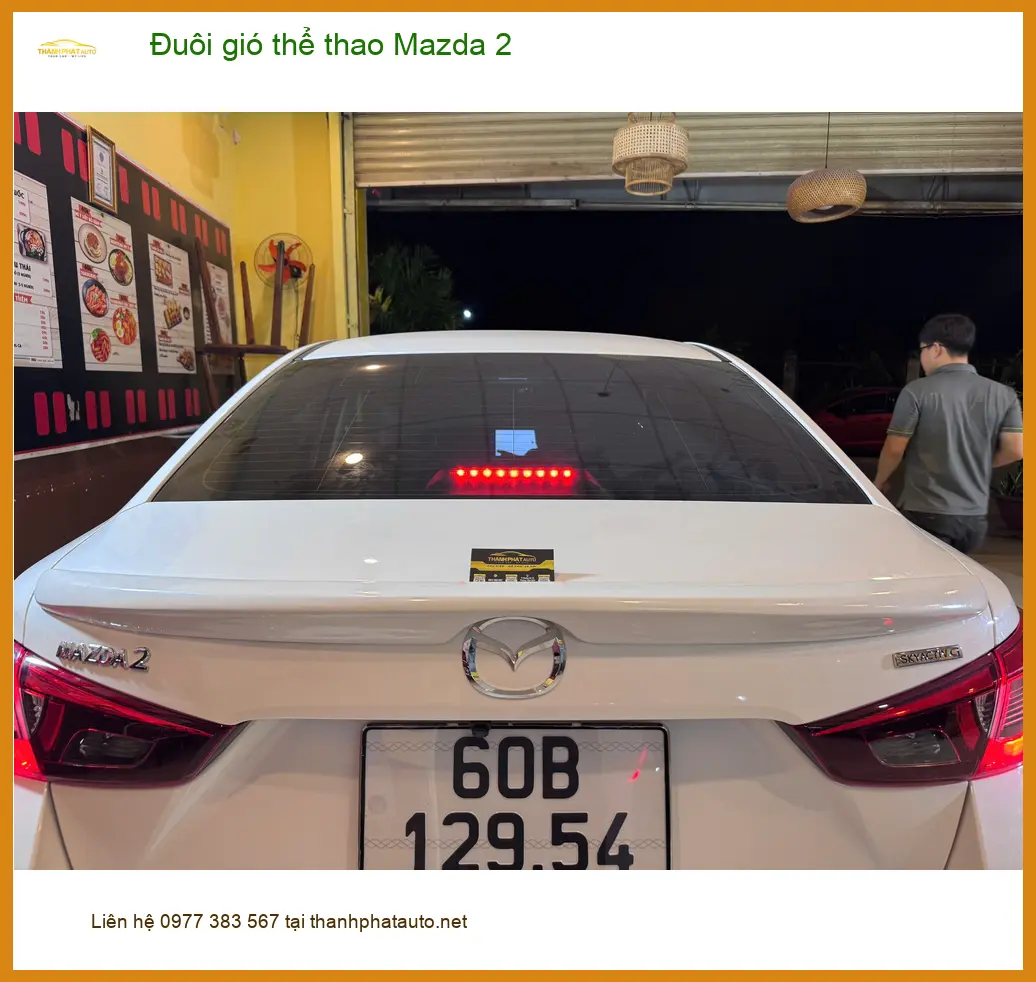 Anh Minh lắp đuôi gió thể thao Mazda 2 tại Quận 12 giúp xe thêm cá tính ảnh thực tế 5
