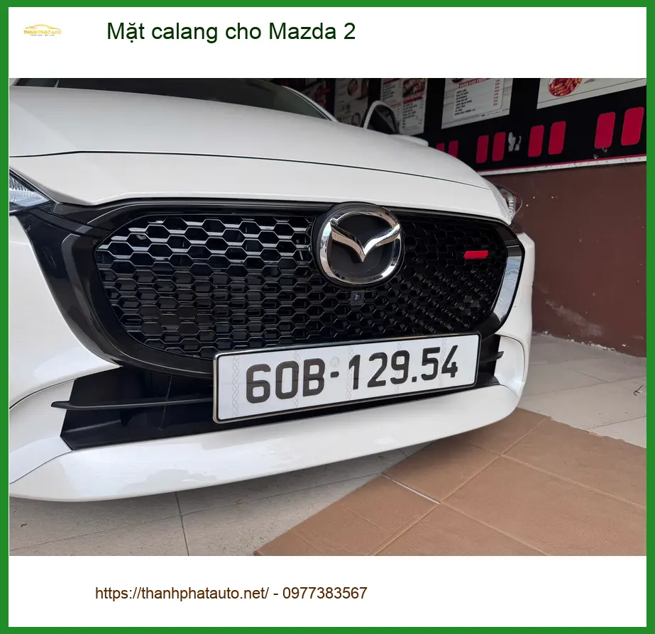 Anh Minh nâng cấp Mặt calang cho Mazda 2 ở Bình Tân để tăng vẻ sang trọng ảnh thực tế 2