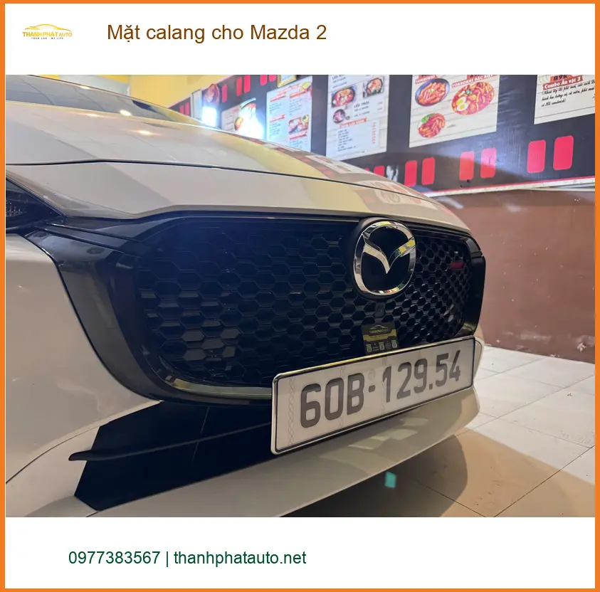 Chị Hương lắp mặt calang cho Mazda 2 tại Thủ Đức để đổi mới diện mạo xe ảnh thực tế 5