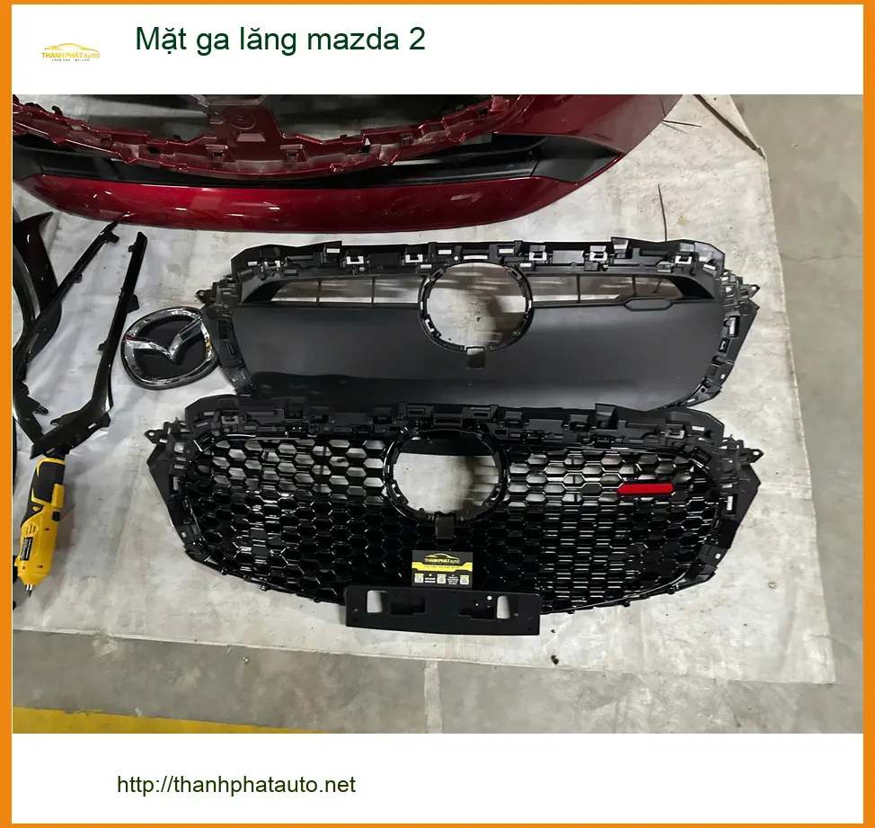 Anh Minh độ Mặt ga lăng Mazda 2 tại Quận 11 để xe trông mới và sang trọng hơn ảnh thực tế 3