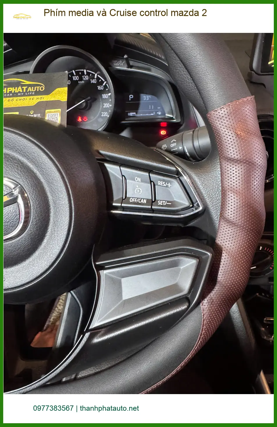 Anh Quang lắp Phím media và Cruise control cho Mazda 2 tại Quận 9