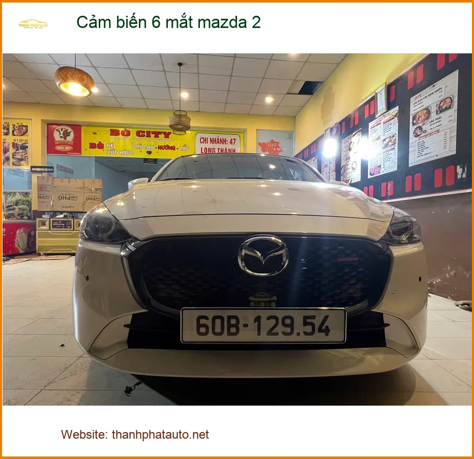Anh Quang lắp cảm biến 6 mắt Mazda 2 tại Quận 7 để lái xe an toàn hơn ảnh thực tế 2