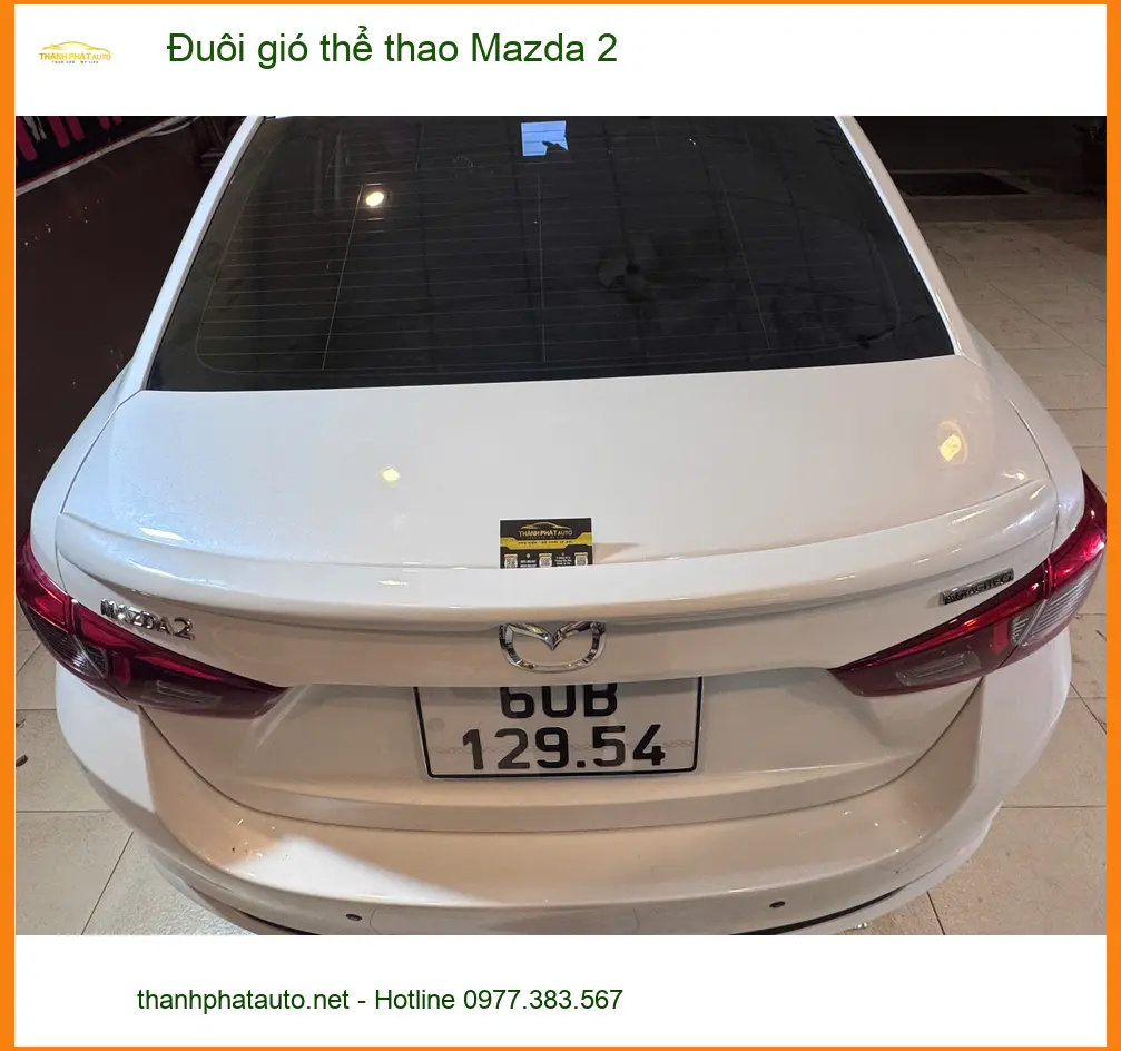 Chị Thuỳ gắn đuôi gió thể thao Mazda 2 tại Quận 2 cho xe thêm phong cách ảnh thực tế 2