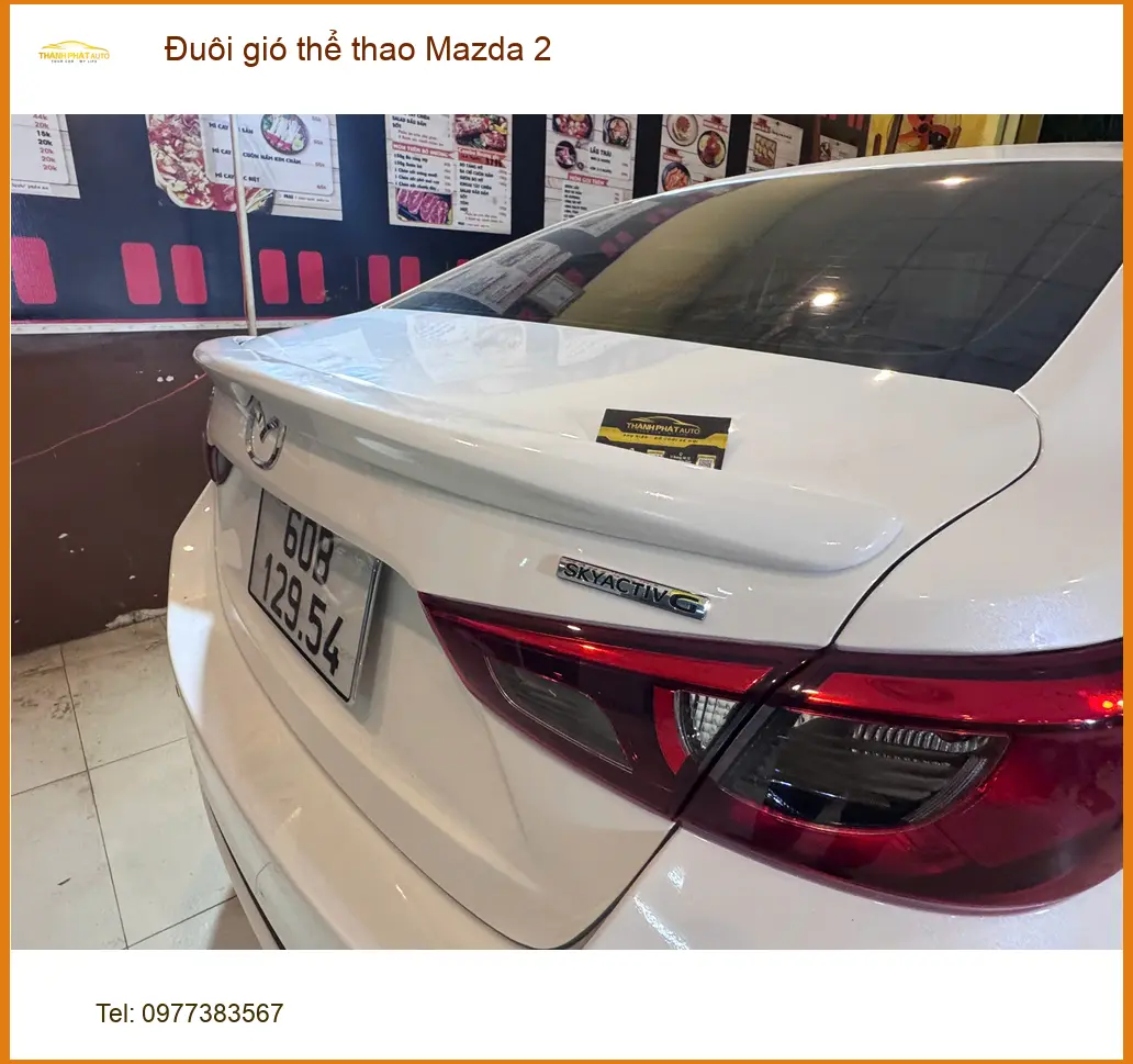 Chị Thuỳ gắn đuôi gió thể thao Mazda 2 tại Quận 2 cho xe thêm phong cách ảnh thực tế 3