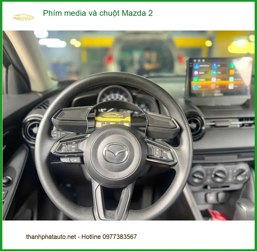 Anh Khánh lắp phím media và chuột Mazda 2 ở Quận 9 cần điều khiển tiện lợi