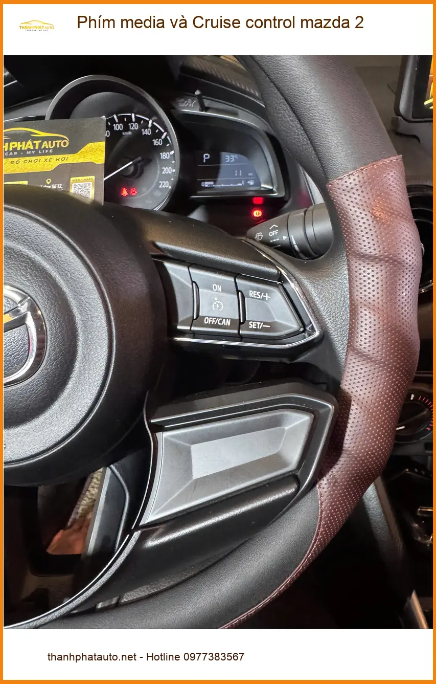 Anh Bình lắp Phím media và Cruise control Mazda 2 ở Quận 8 cho chuyến đi xa