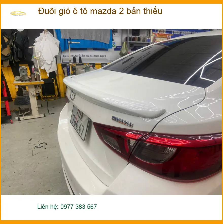 Anh Minh lắp đuôi gió ô tô Mazda 2 bản thiếu tại Quận 6, xe thêm phong cách ảnh thực tế 3