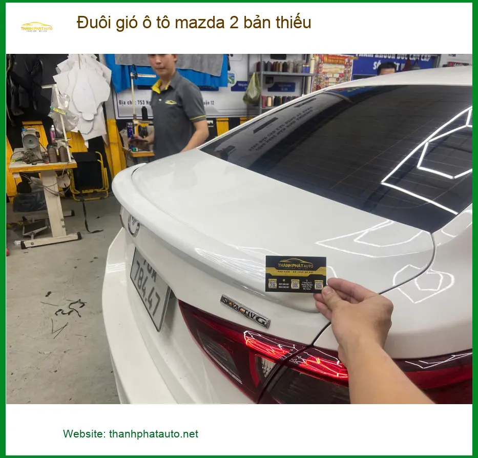 Anh Minh lắp đuôi gió ô tô Mazda 2 bản thiếu tại Quận 6, xe thêm phong cách ảnh thực tế 4